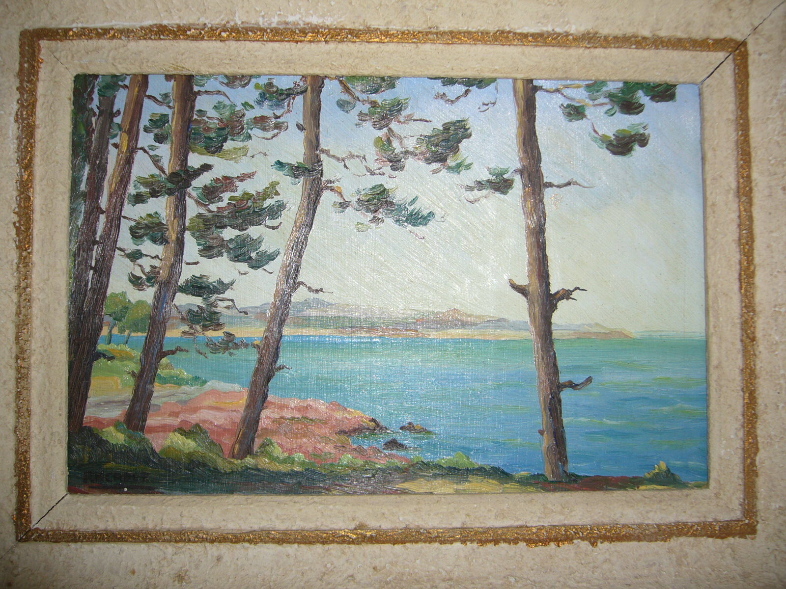 Old framed oil-painted painting depicting a seaside