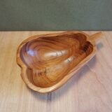 Empty wooden pocket in the shape of a vintage pear