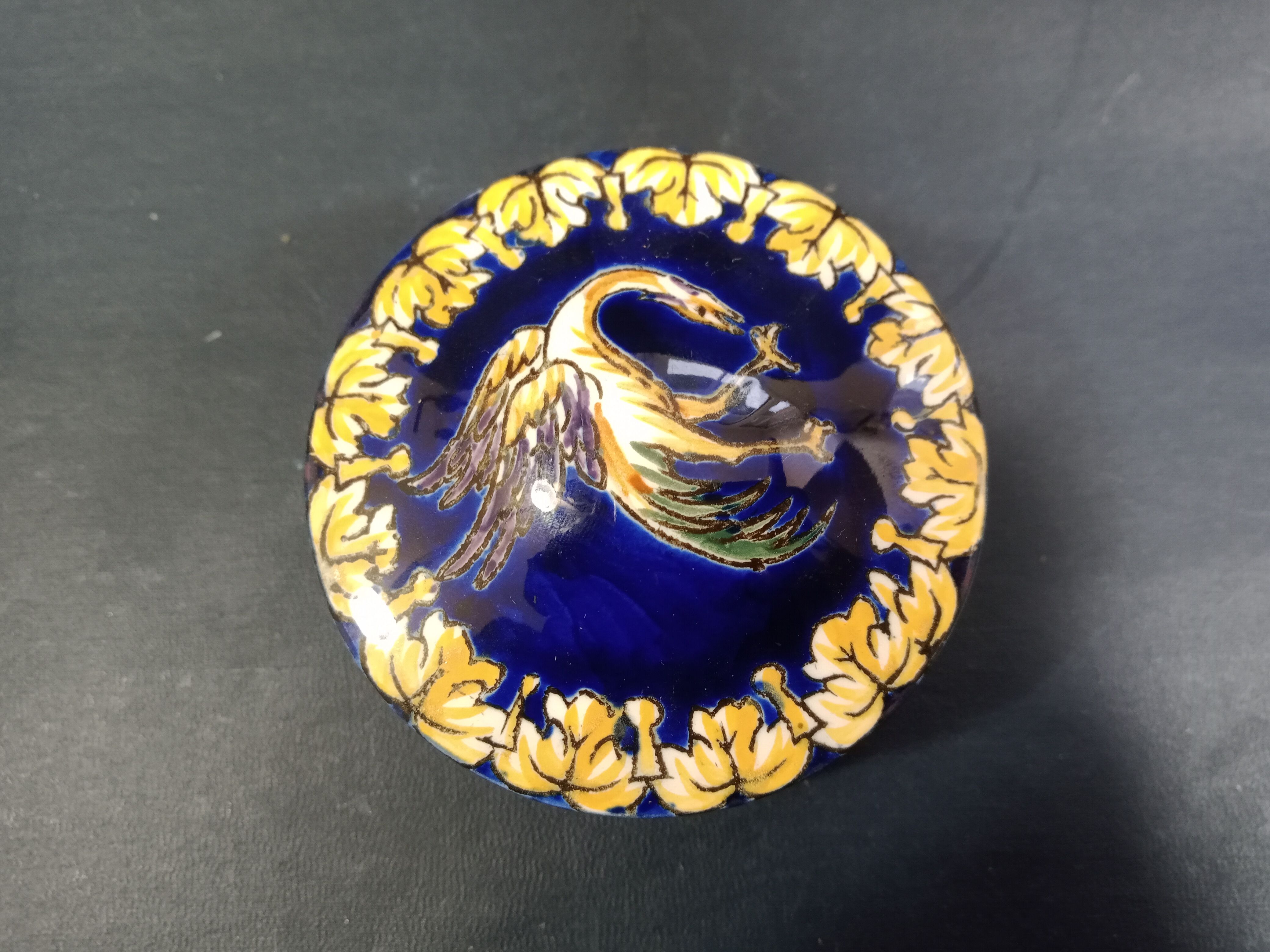 Empty Gien earthenware pocket decorated with chimera decoration