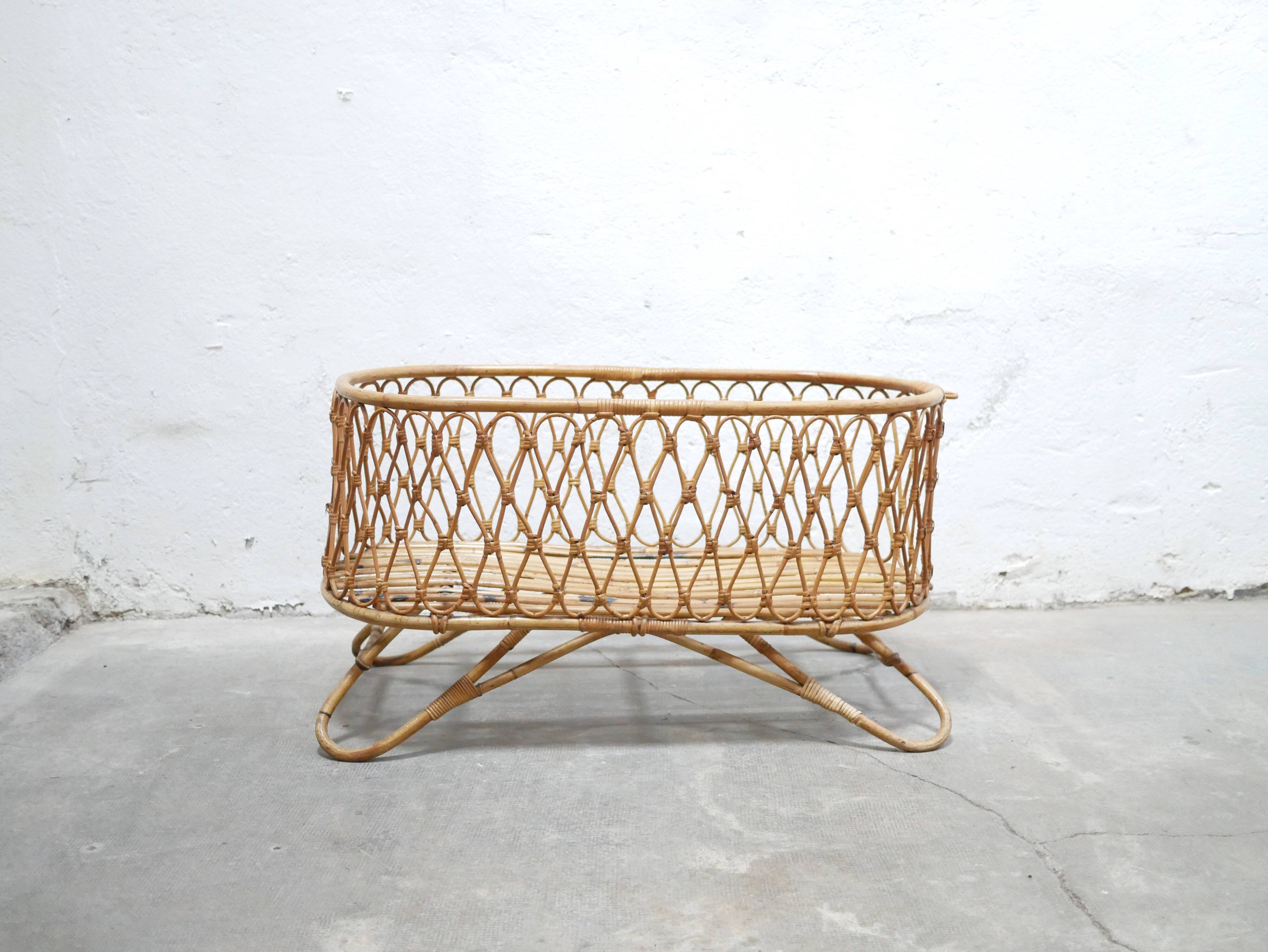 Vintage rattan cradle