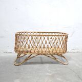 Vintage rattan cradle
