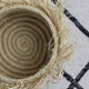 Fringed basket in raffia