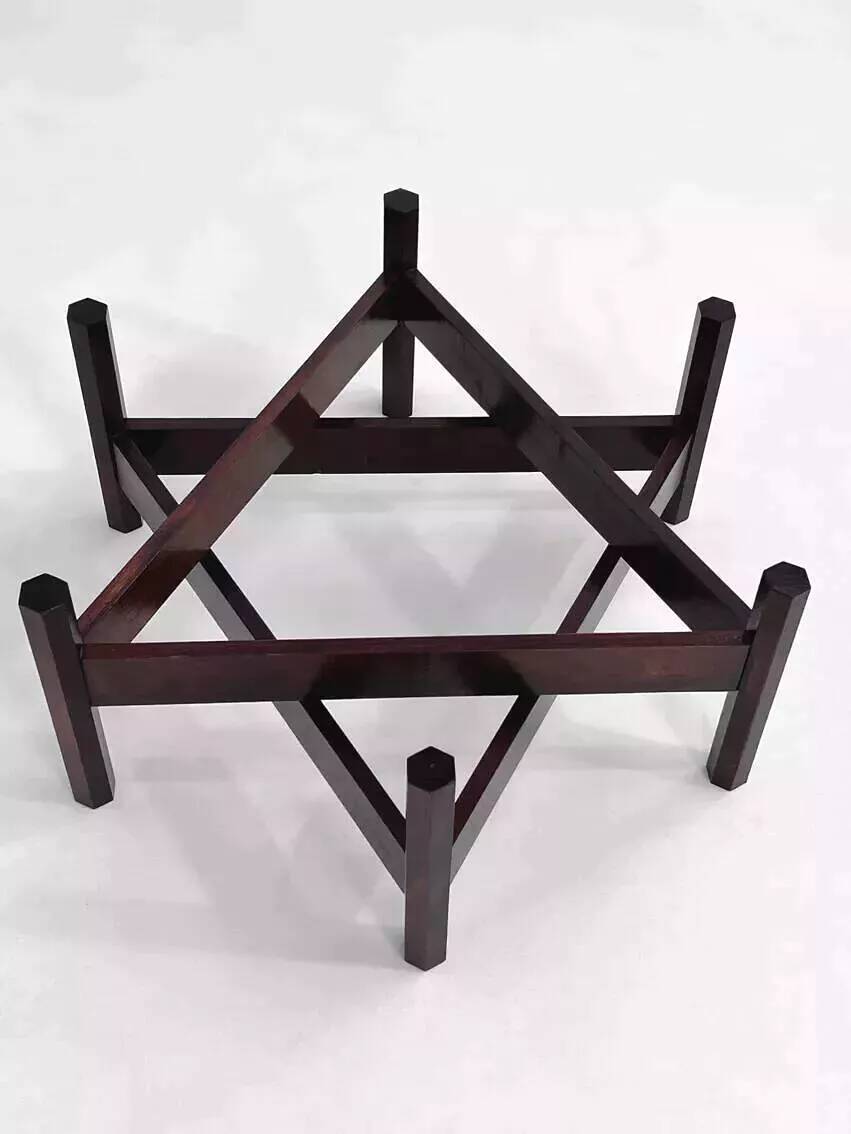 Wooden coffee table with round smoked glass top