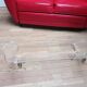 Design coffee table from Habitat in transparent plexiglass, mounted on wheels.