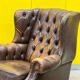 Brown leather chesterfield wing chair with Ottoman