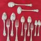 Antique silver-plated monogrammed cutlery set