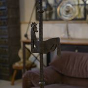 Wrought iron floor lamp in the style of the Marolles workshops from the 1950s.