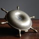 Brass ashtray and candlestick shaped boat bar