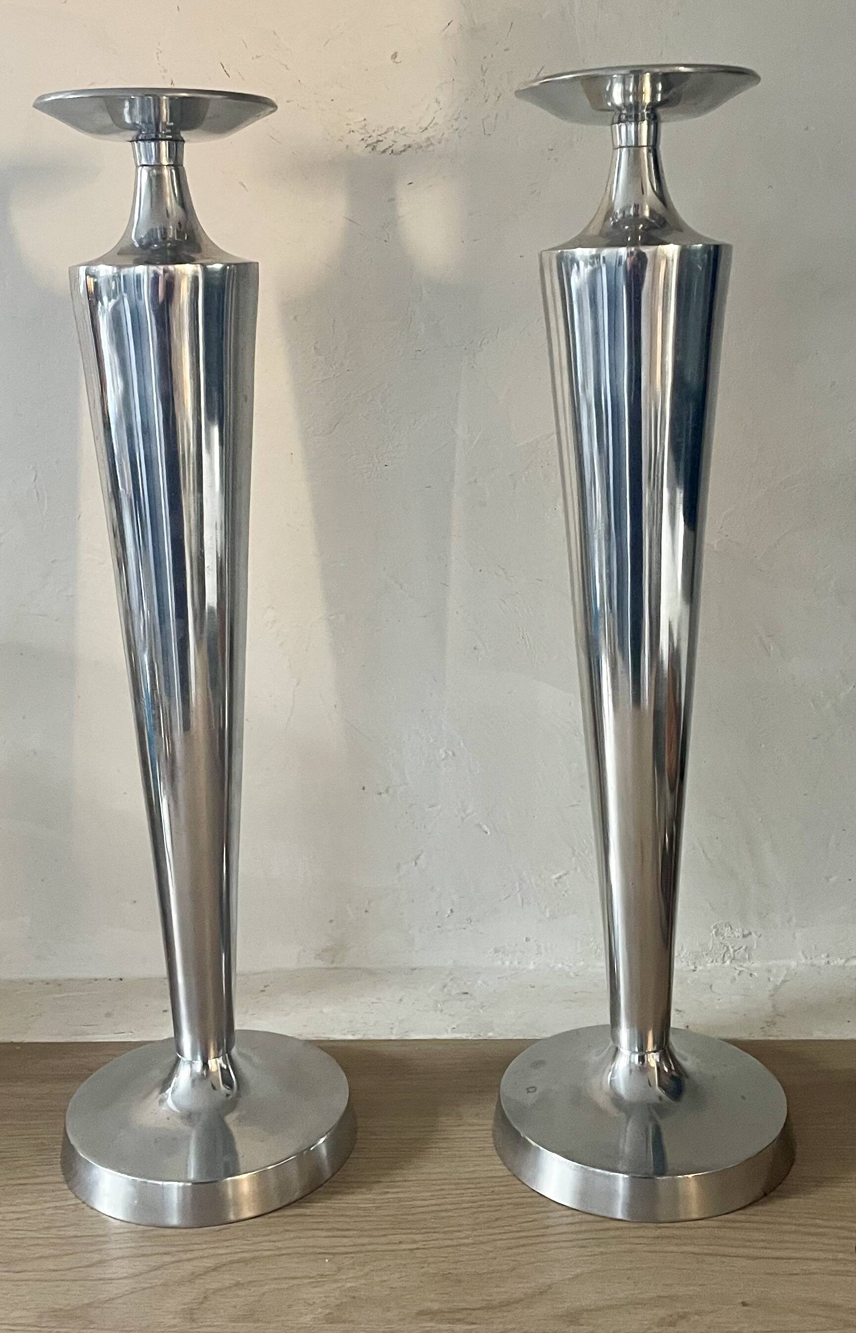 Pair of aluminium cast candle holders 52cm