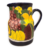 Ceramic pitcher with fruit and vine decoration - colorful rustic style