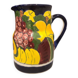 Ceramic pitcher with fruit and vine decoration - colorful rustic style