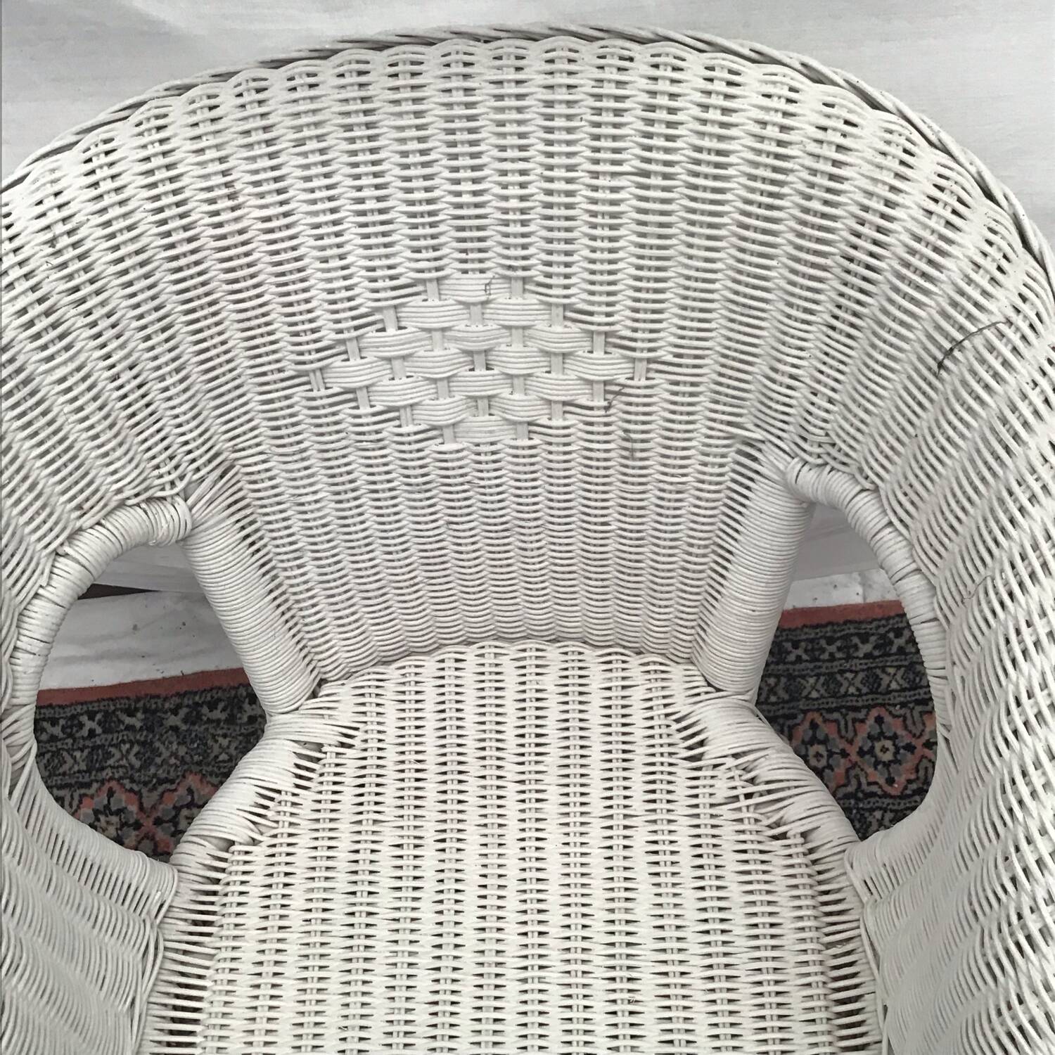 White rattan armchair with pretty vintage