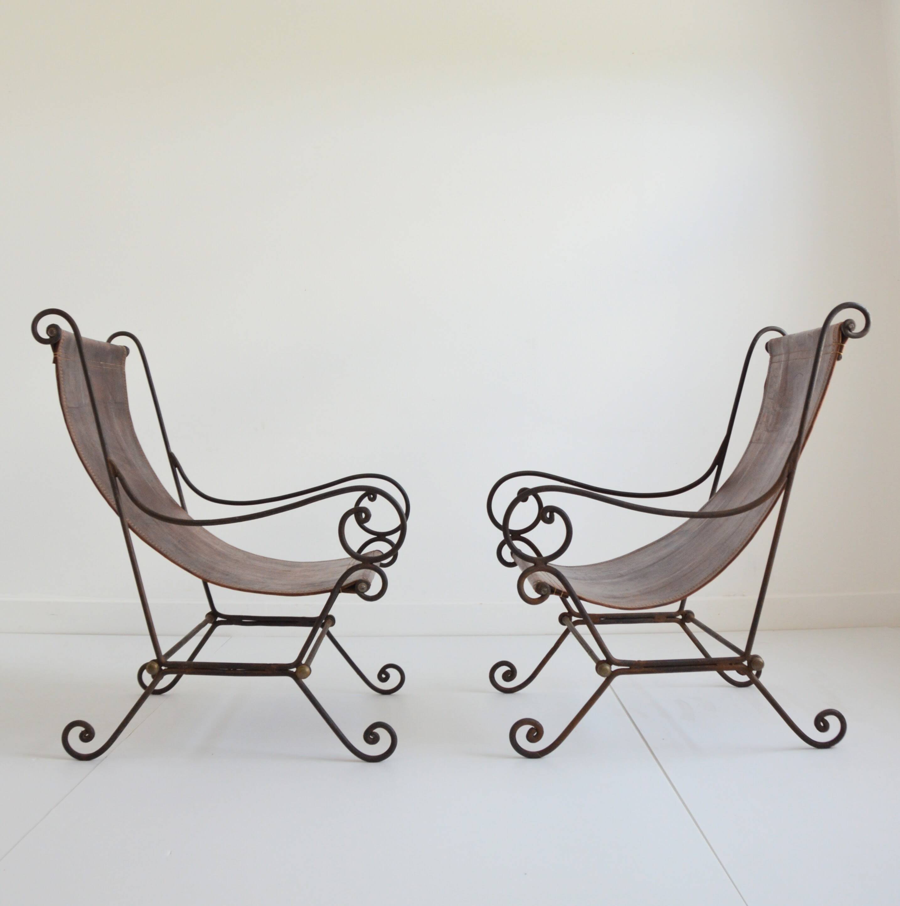 Paire de fauteuils en fer forgé et cuir vintage