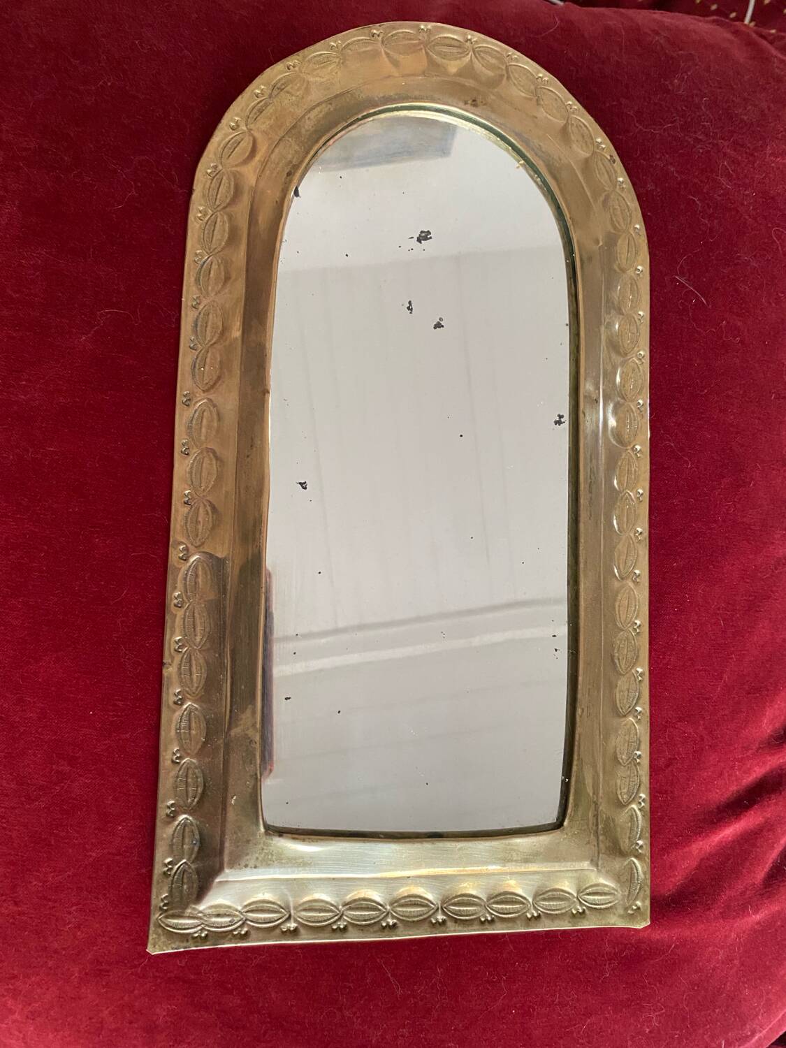 Ethnic brass mirror crafted in the 1980s.
