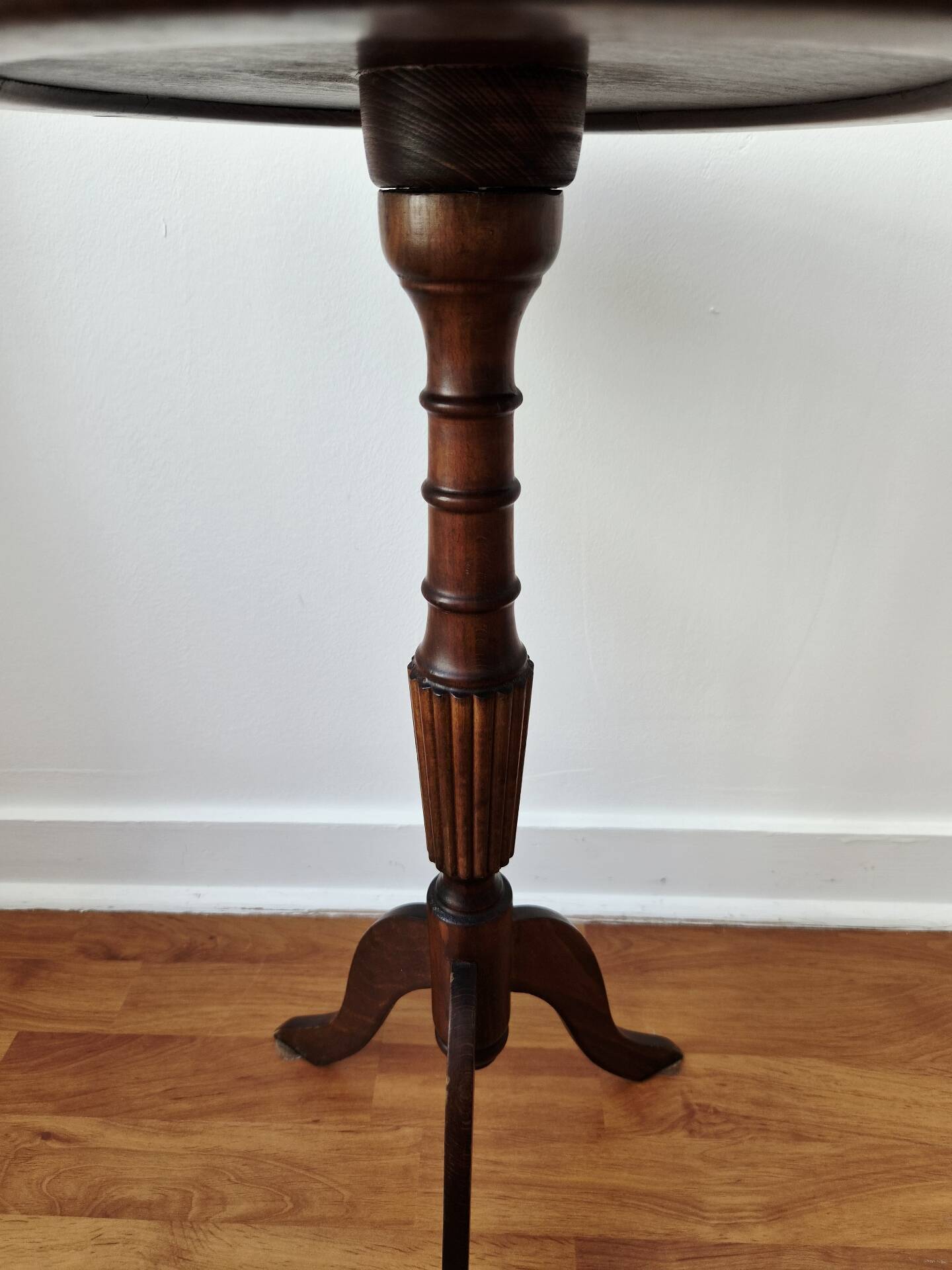 Small tripod wooden table with a vintage round top -