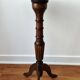Small tripod wooden table with a vintage round top -