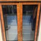 Napoleon III display cabinet in rosewood veneer and marquetry, 19th century.