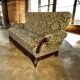 Vintage baroque chair with a rich floral pattern