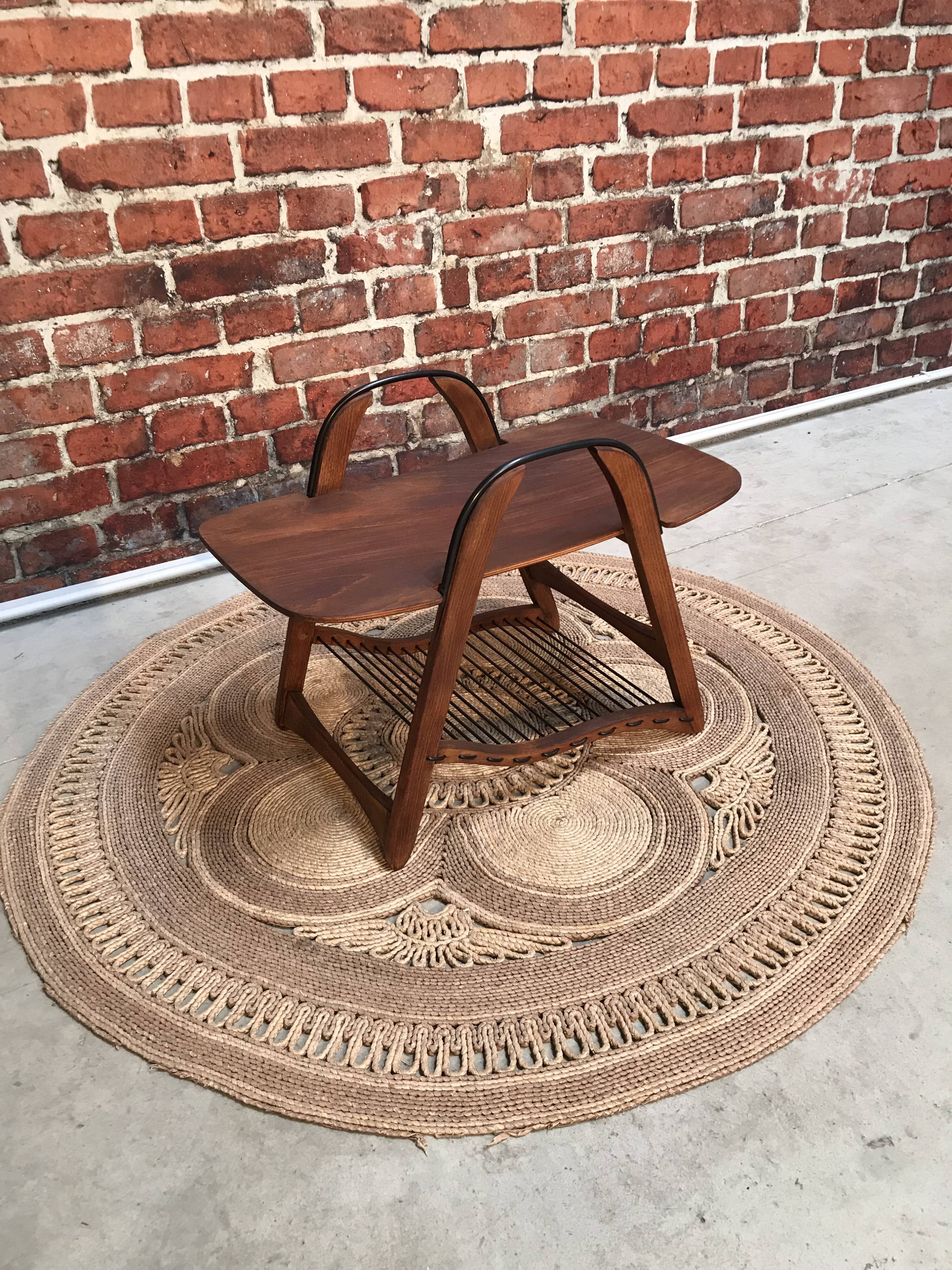 Coffee table with scoubidou magazine holder