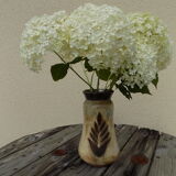 Flamed stoneware vase decorated with leaves