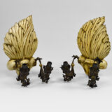 Pair of Hollywood Regency sconces in carved, painted and patinated wood, 1950s