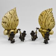 Pair of Hollywood Regency sconces in carved, painted and patinated wood, 1950s