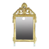 Beautiful Louis XVI style mirror in wood and gilded stucco. Nineteenth