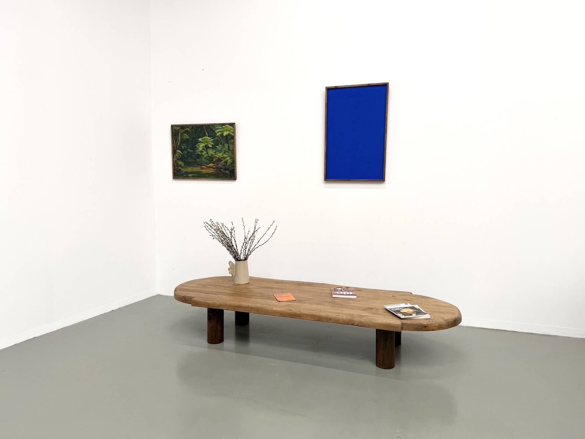 XXL oval coffee table in solid oak, cylindrical base, 1950s.