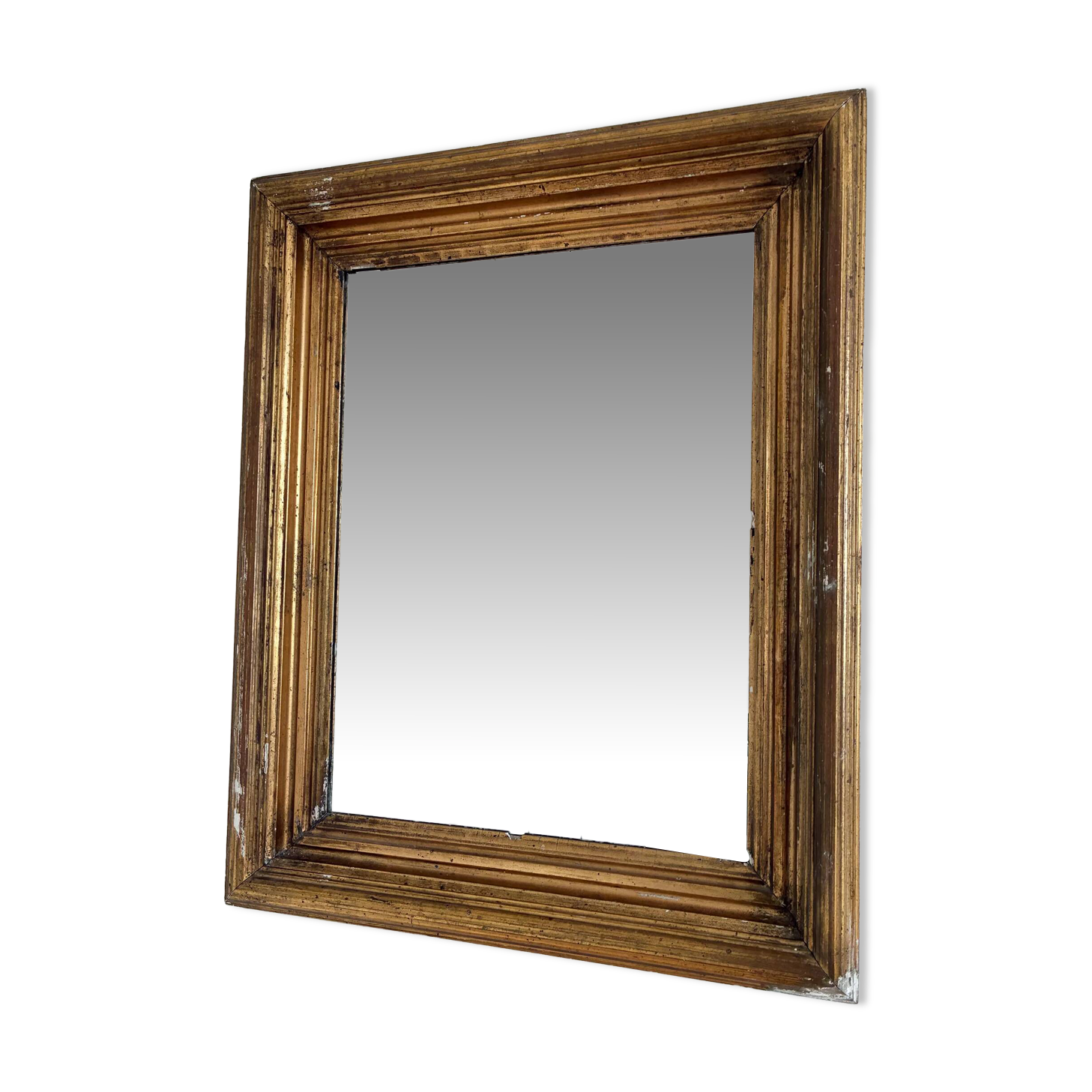 Antique giltwood wall mirror in gold