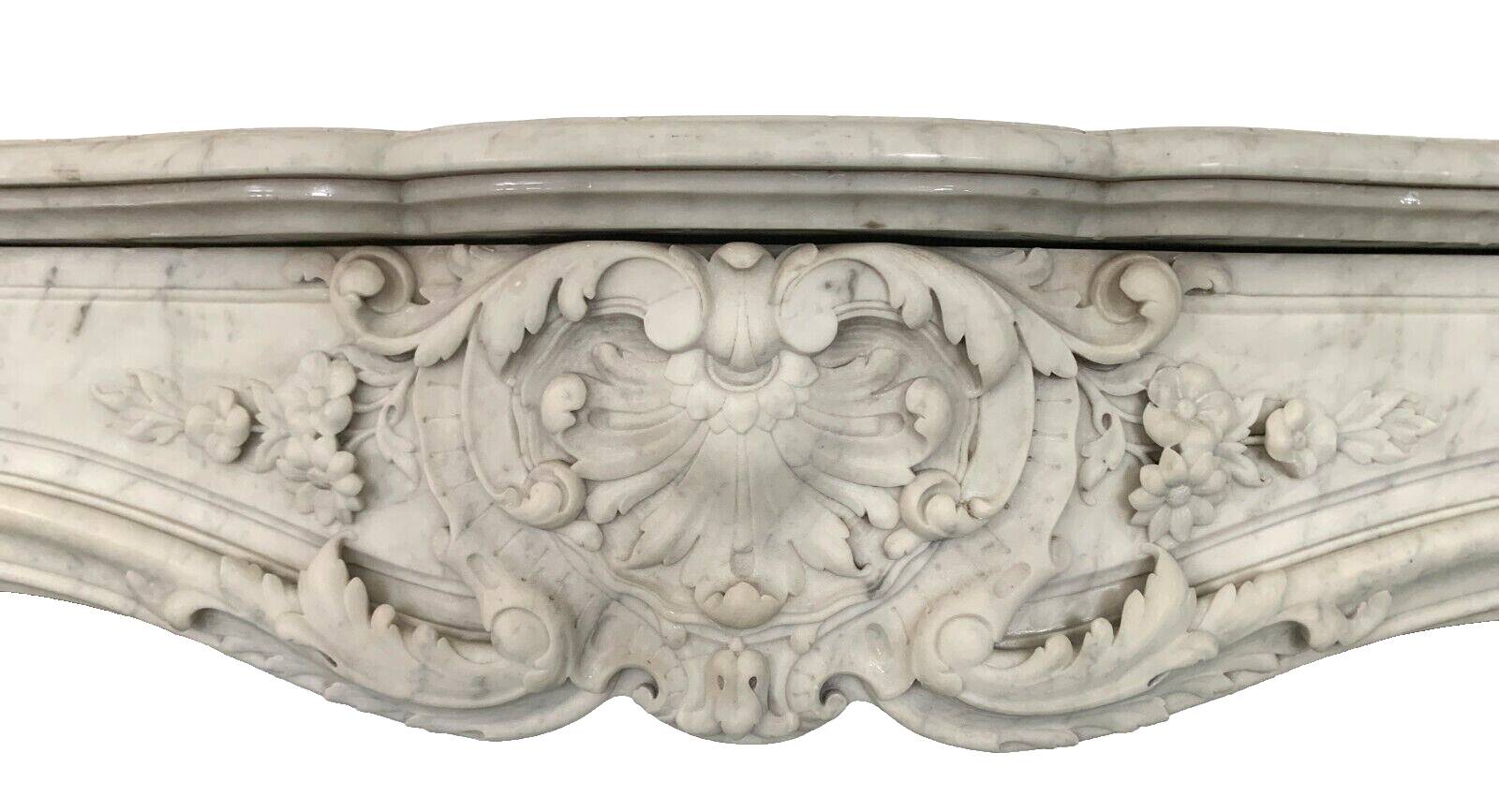 Louis XV style fireplace in white Carrara marble 19th century