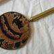 Art Deco era brass hand mirror