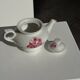 Complete porcelain teapot and warmer with pink floral decoration H18