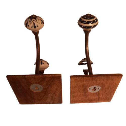 Duo of coat hooks, coat racks in wood and bronze porcelain