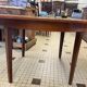 Table ronde en bois avec rallonges intégrées