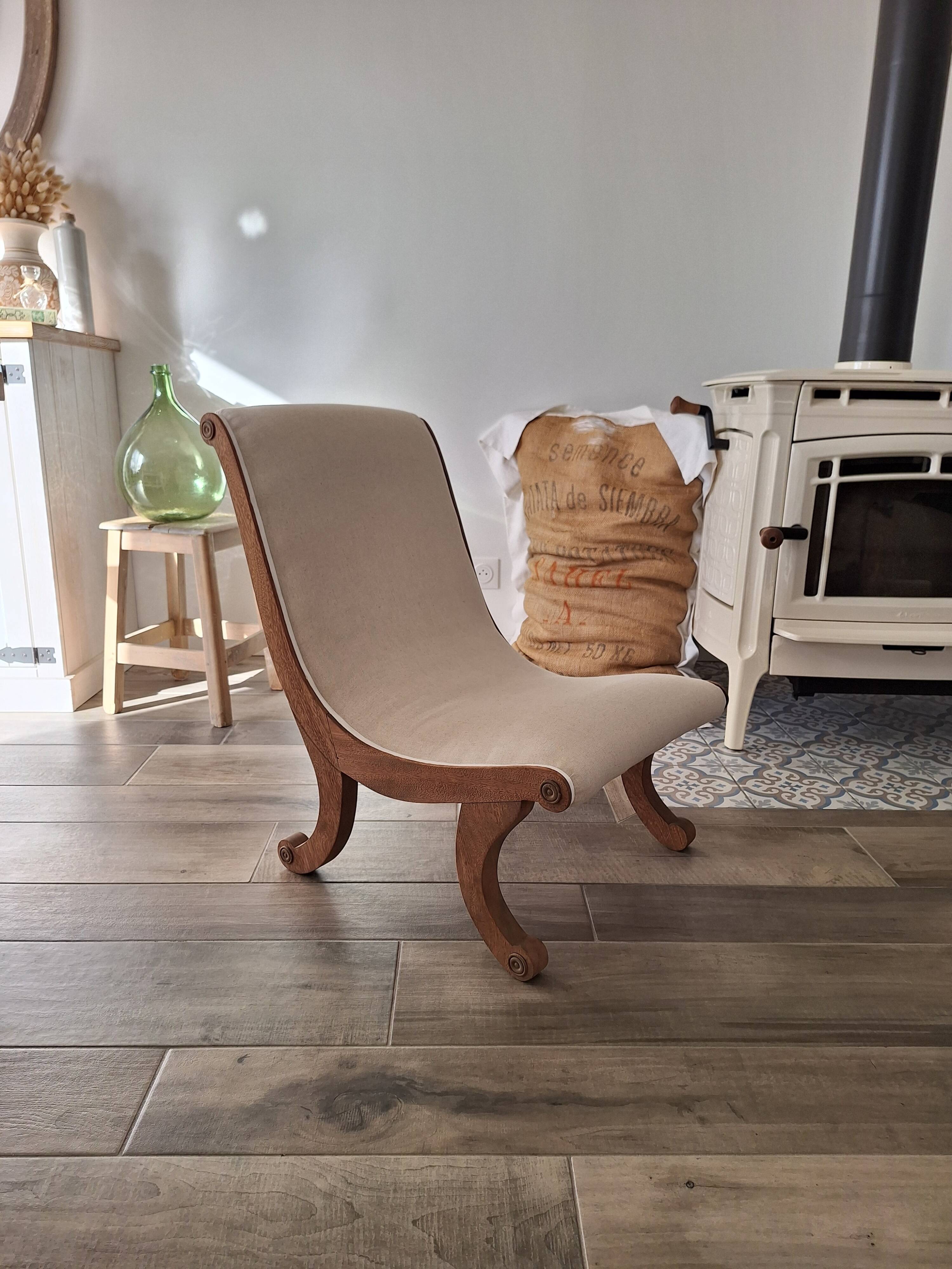 Vintage gondola armchair in beige linen fabric.