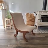 Vintage gondola armchair in beige linen fabric.