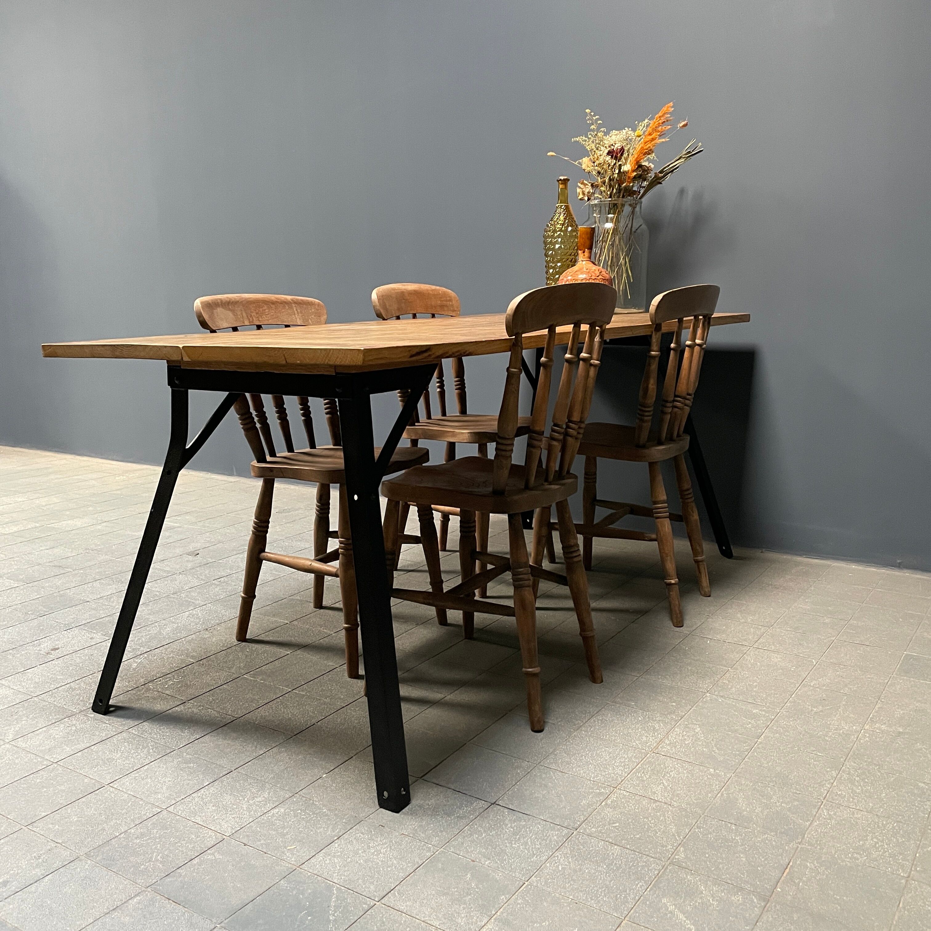 Handmade industrial oak dining table with black metal legs