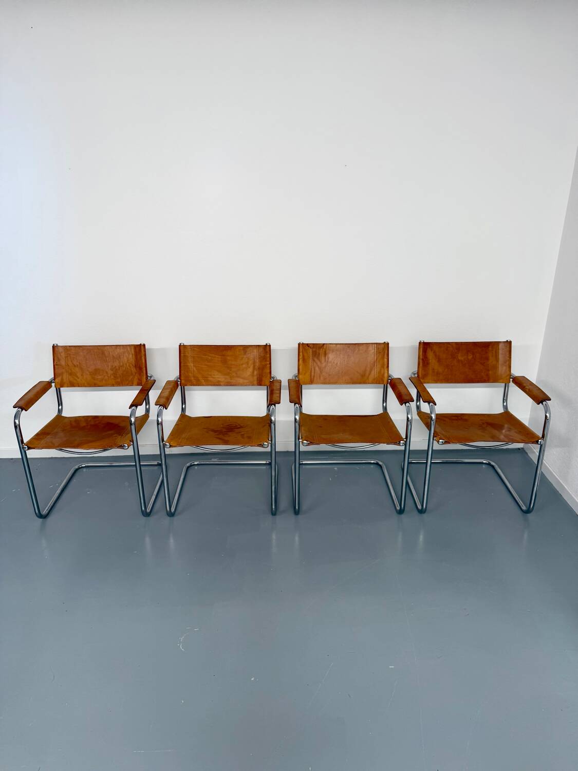 4 vintage tubular chairs with patinated leather designed by Mart Stam