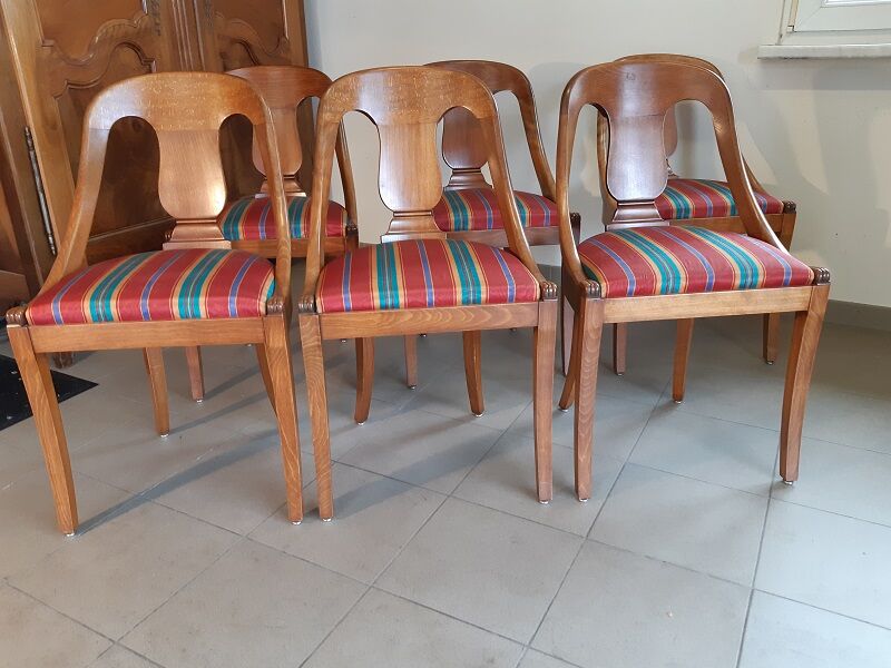 Gondola-style empire chairs