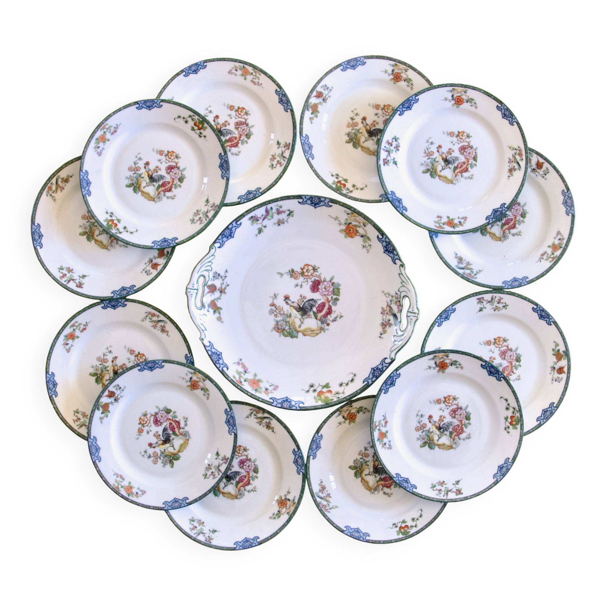 Service ancien de 1930 en porcelaine au décor oiseaux, papillons et coq