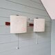 Pair of Scandinavian wall sconces in teak and plastic resin, 1960.