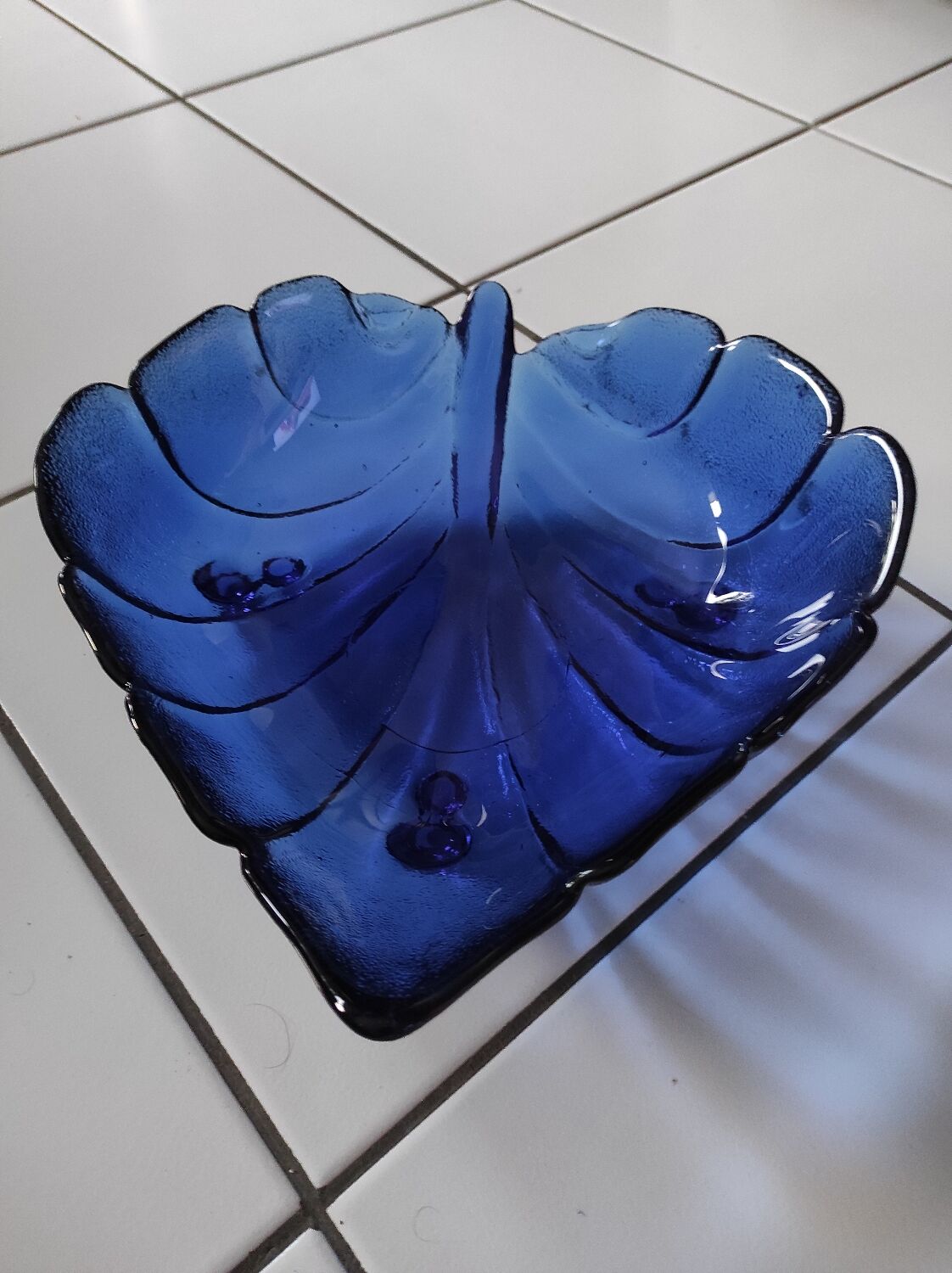 Blue glass fruit bowl