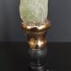 Cabinet of Curiosities green calcite on pedestal