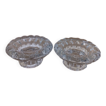 Moulded glass candle holders.