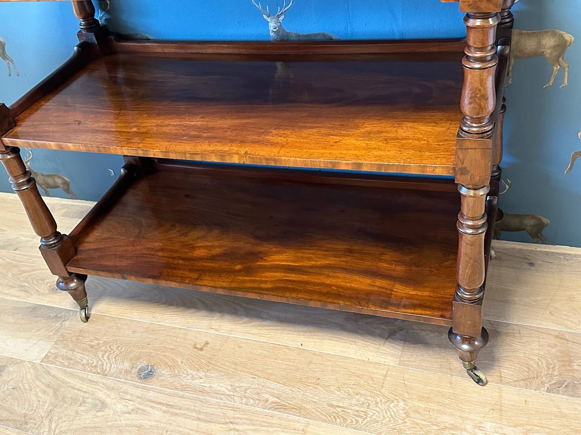 antique mahogany three-tiered étagère