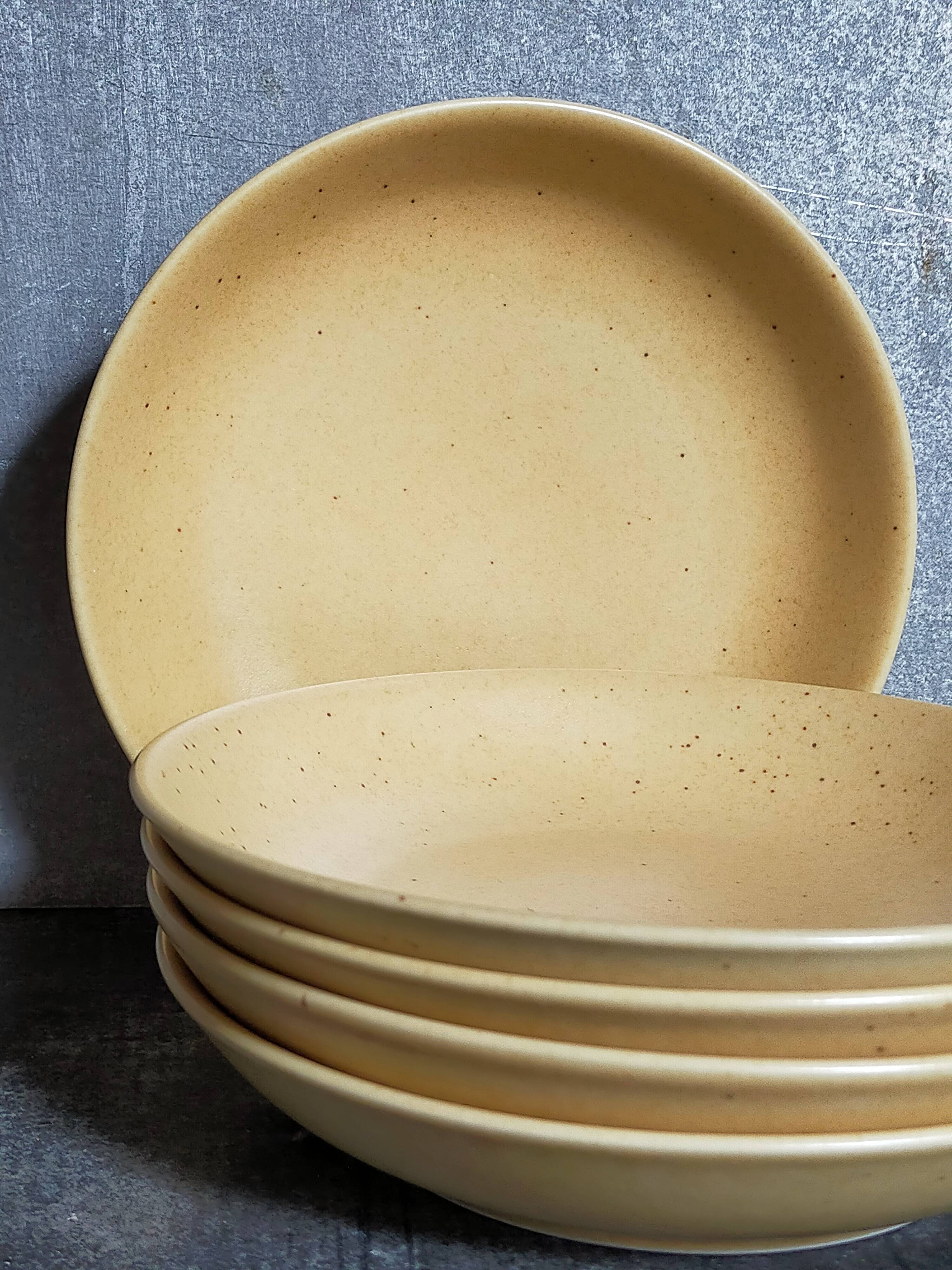 Five vintage natural stoneware soup plates