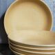 Five vintage natural stoneware soup plates