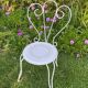 Paire de chaises de jardin anciennes en fer forgé ouvragé
