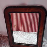 Old mirror frame in painted plaster