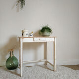 Old table in patinated white wood